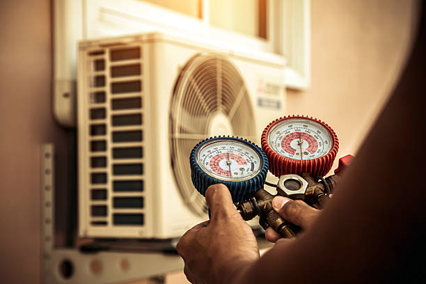 Professional Furnace Repair technician working in Little Falls, NY